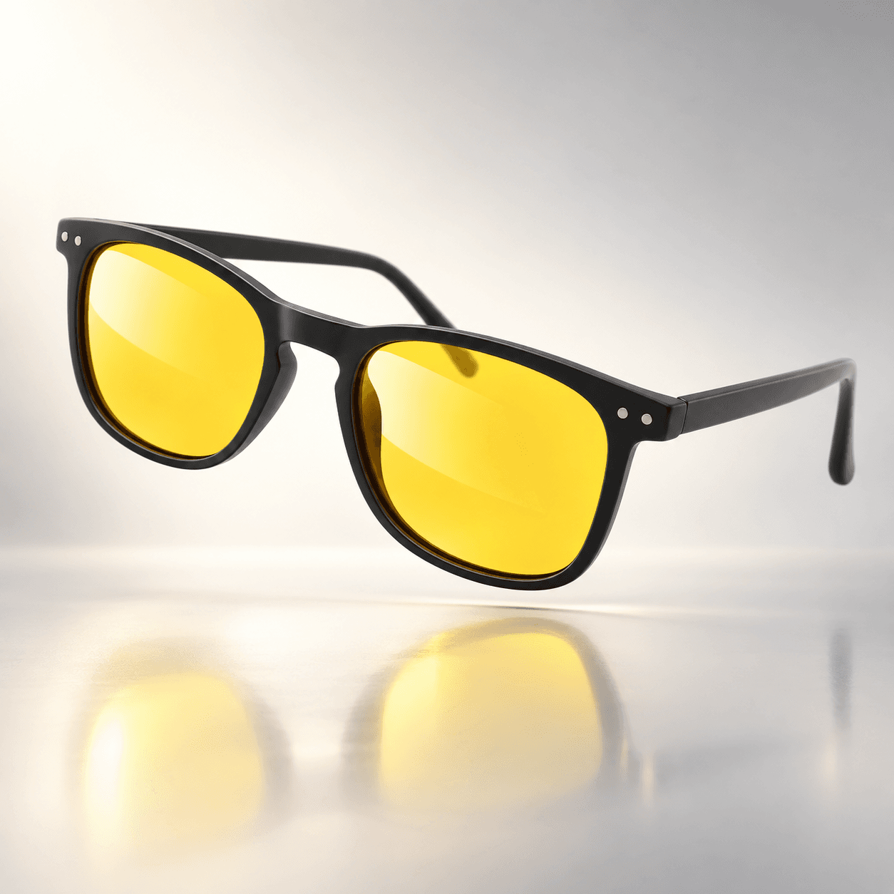 Blue Ben glasses with yellow lenses floating at an angle, studio product shot