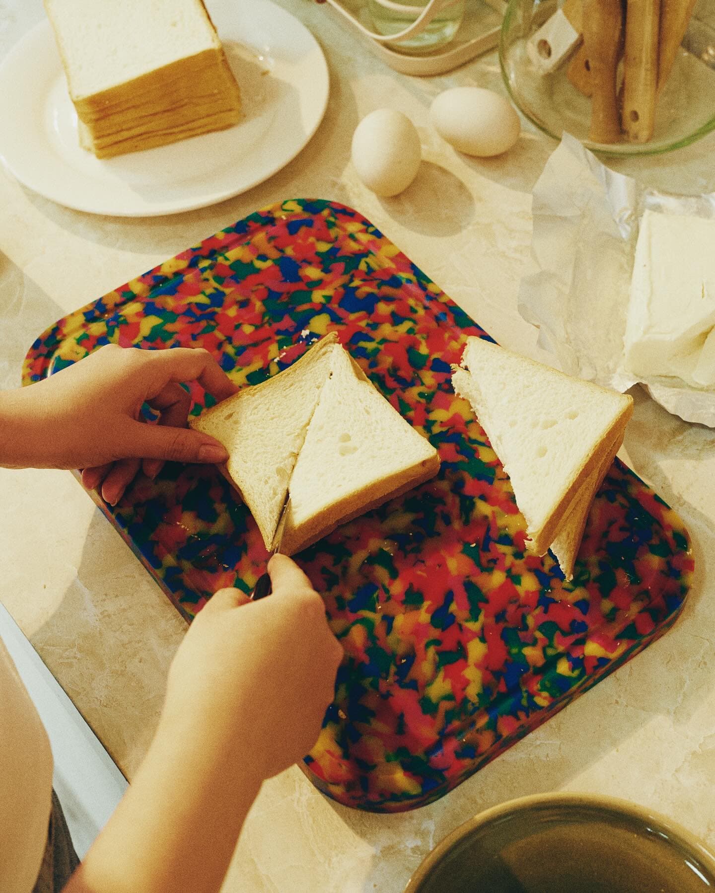 Sandwich served on a terrazzo tray, lifestyle food photo