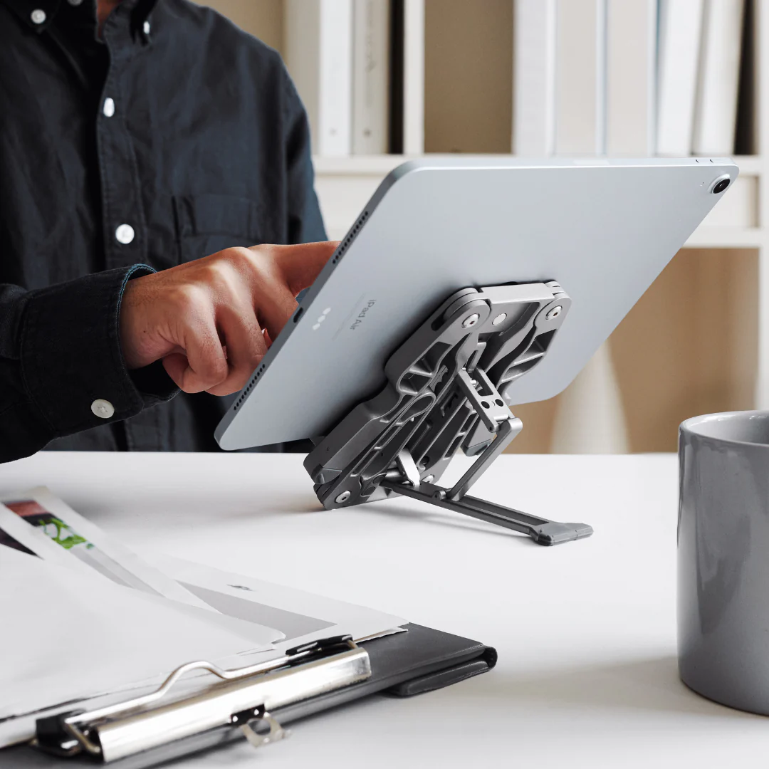 Desk Labs adjustable stand holding an iPad on a desk