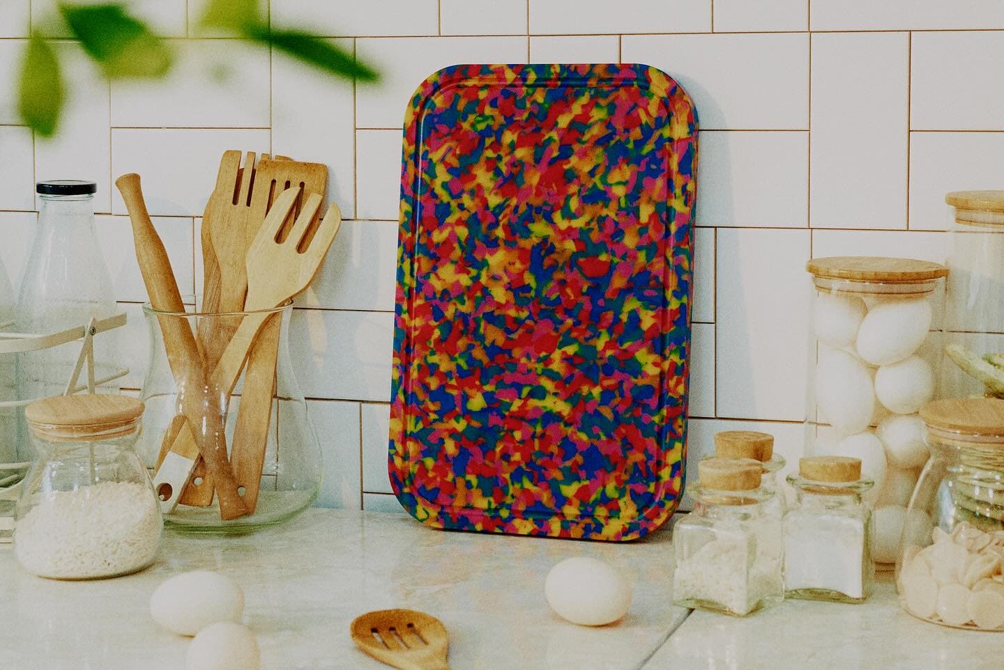 Terrazzo tray on tiles, overhead product still life